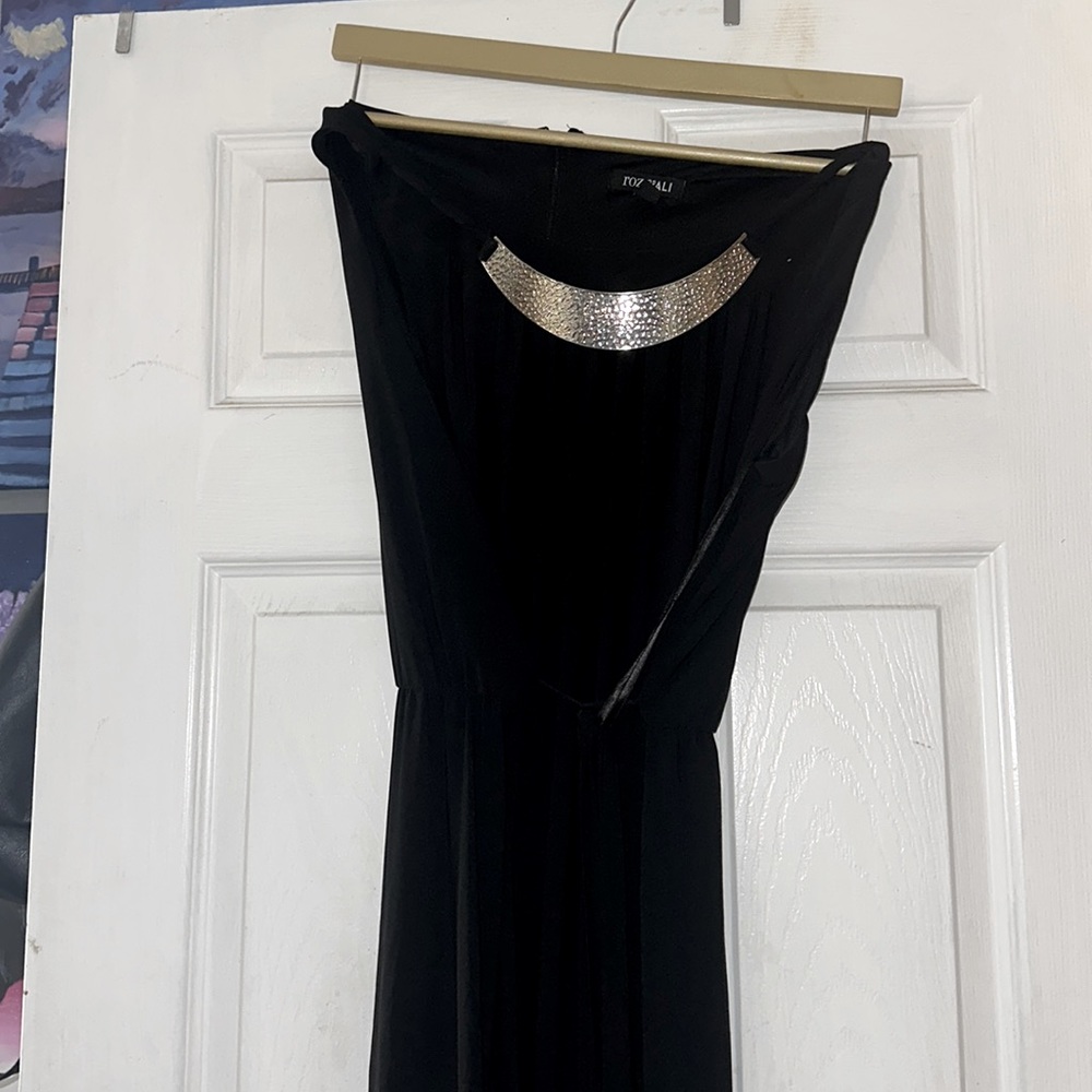 Black long Dress with Slit on the side. Dress is short sleeve.